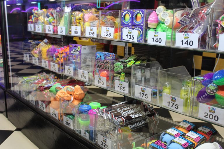 Redemption prize counter at Fun Zone Skate Center, featuring a variety of toys and prizes for guests