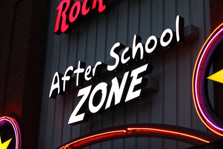 Fun Zone Skate Center After School Zone sign, where children can enjoy activities, homework time, and skating.