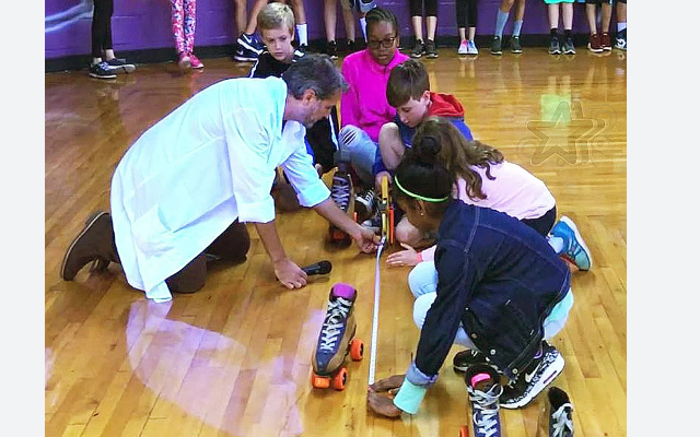 Students participating in the STEM on Skates program at Fun Zone, learning physics through skating.