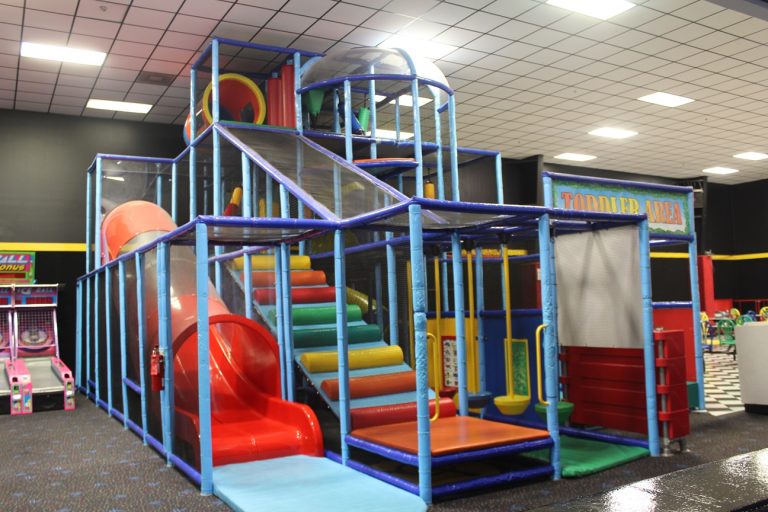 Soft play area at Fun Zone Skate Center with colorful slides, climbing structures, and padded play zones for kids.