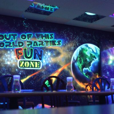 Vibrant cosmic-themed party room at Fun Zone, perfect for hosting unforgettable birthday parties and events.